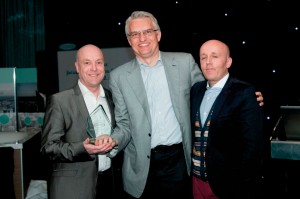Paul Margerison and Kevin Newby with Peter Munk (centre)